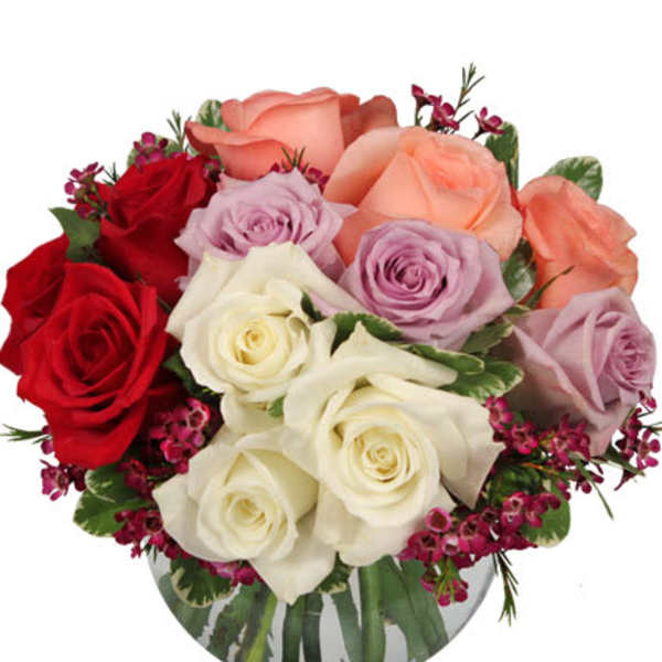 Bouquet of red, peach, lavender, and white roses in a vase