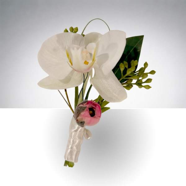 White orchid boutonniere with a small pink accent bloom and ribbon wrap