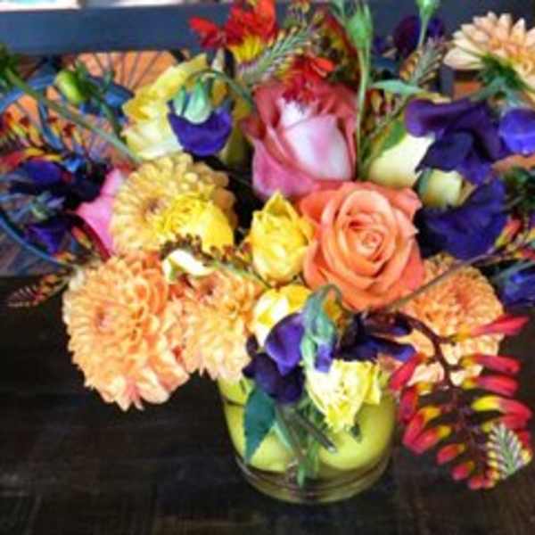 Colorful mixed bouquet in a glass vase