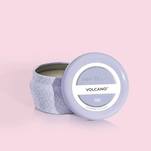 Lavender candle in a patterned tin with a matching lid