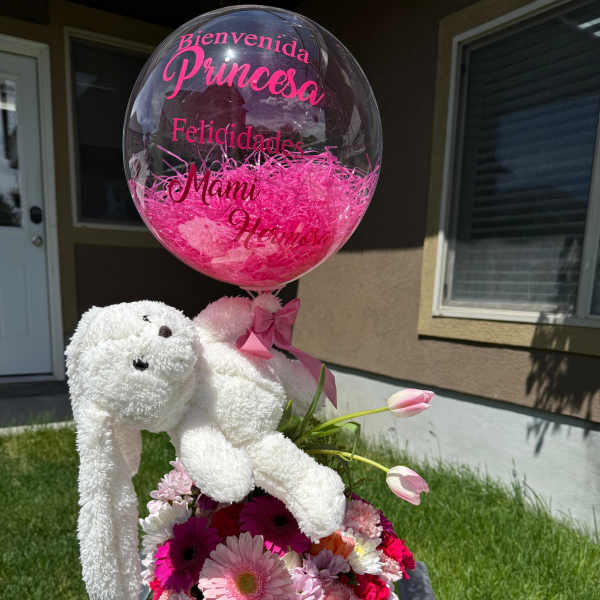 Pink balloon with a teddy bear and mixed flowers in a gift box