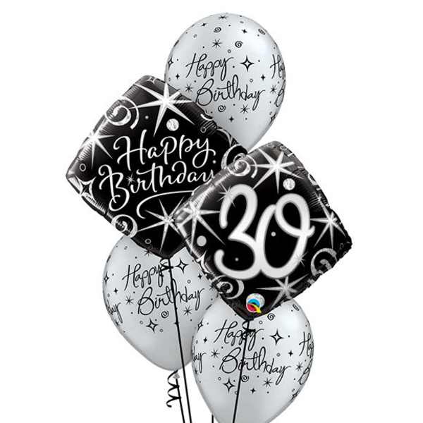 Cluster of black and white birthday balloons, including a "30" balloon
