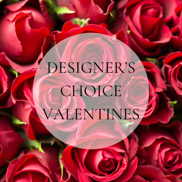 Close-up of red roses with a Valentine's Day label