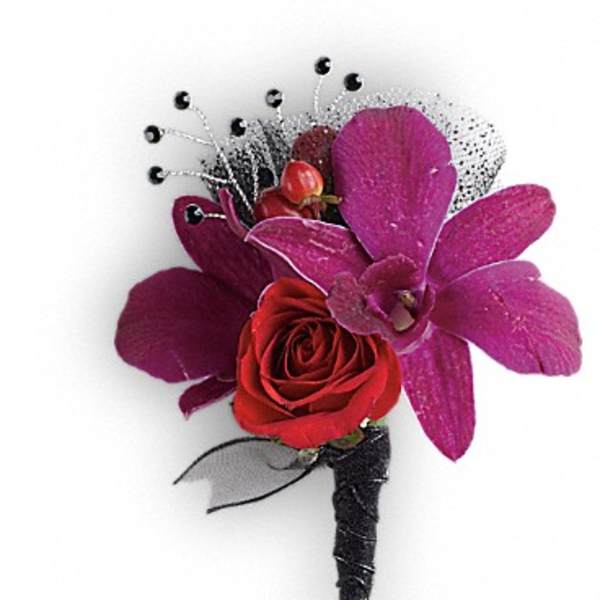 Red rose boutonniere with purple orchid petals and black accents