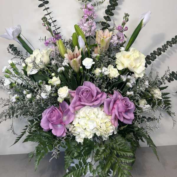 Large floral standing spray with pink and white roses and lilies
