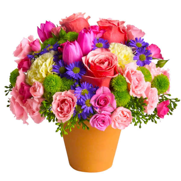 Mixed pink and purple bouquet in an orange pot