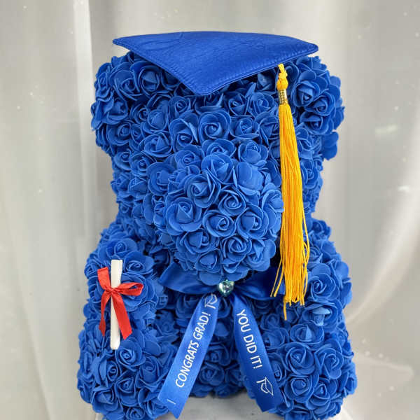 Blue rose-covered graduation teddy bear with cap and tassel