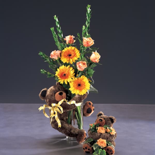 Flower arrangement with yellow gerberas and peach roses, plus two teddy bears