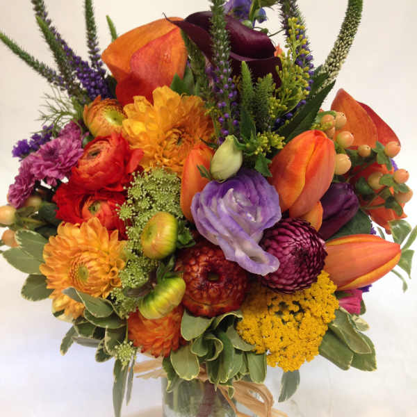 Colorful mixed bouquet in a clear glass vase
