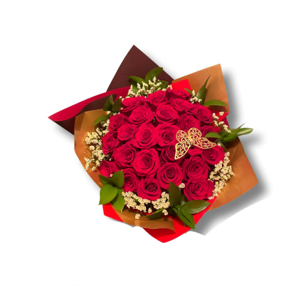 Bouquet of red roses wrapped in brown and red paper