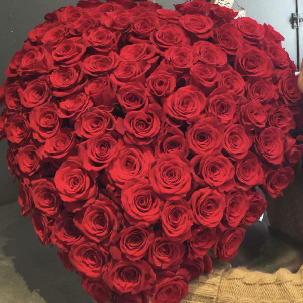 Large heart-shaped bouquet of red roses