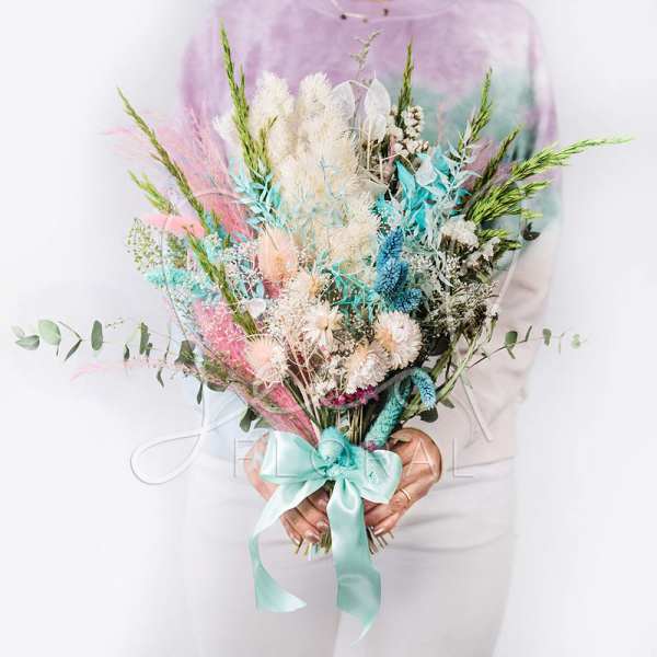 Large pastel bouquet with dried flowers and a satin ribbon
