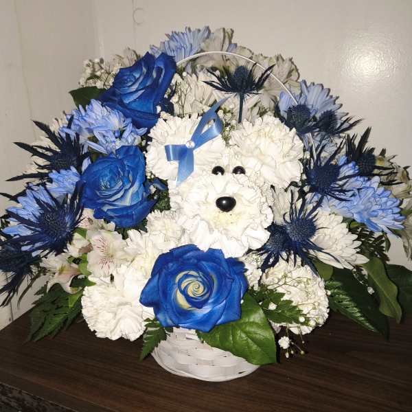 Blue and white flower basket arranged as a dog face