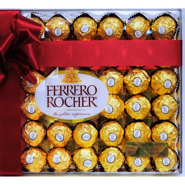 Box of Ferrero Rocher chocolates tied with a red ribbon