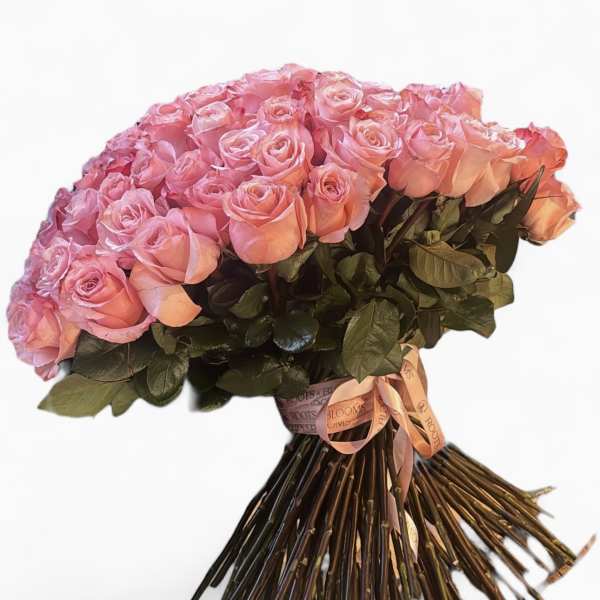 Large bouquet of pink roses tied with a ribbon