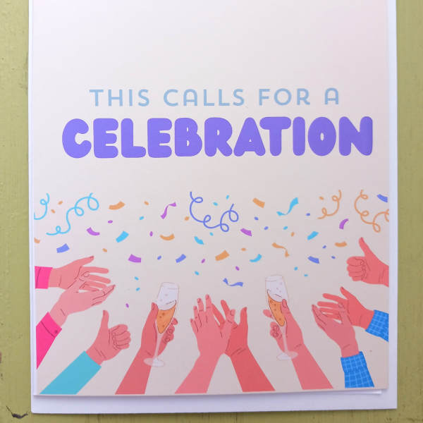 Celebration greeting card with colorful confetti and hands raising champagne glasses