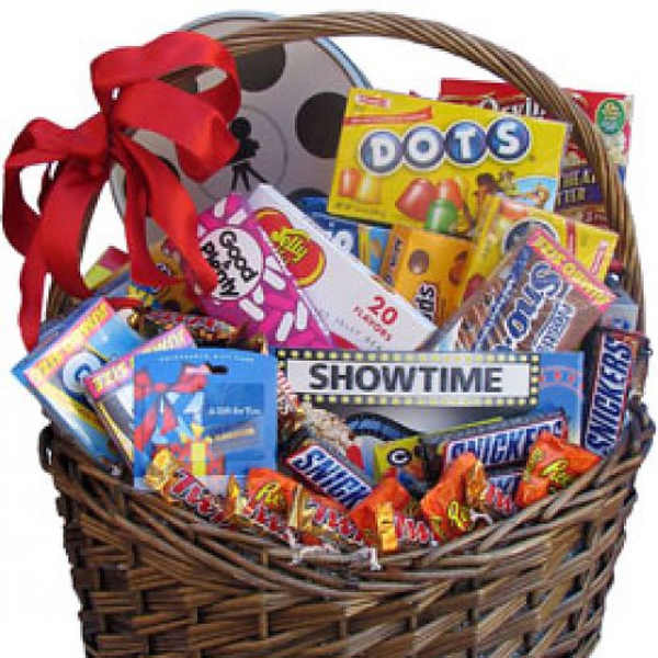 Basket of assorted candy and movie-themed snacks with a red ribbon