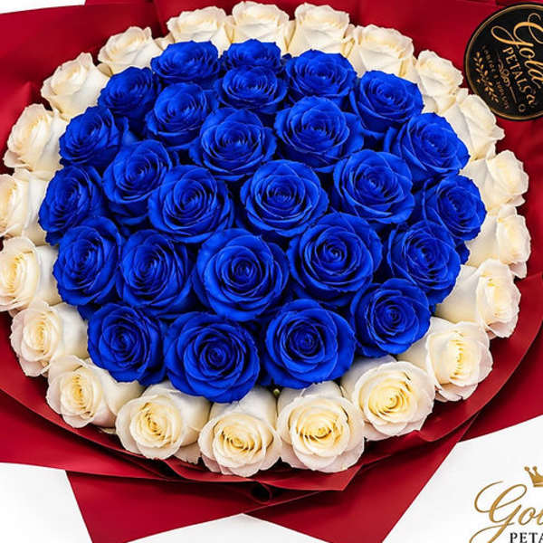 Bouquet of blue and white roses wrapped in red paper