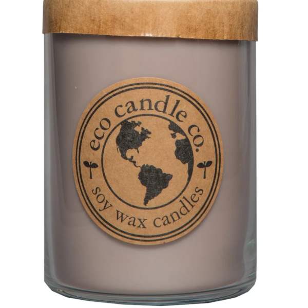 Soy wax candle in a glass jar with a kraft paper lid