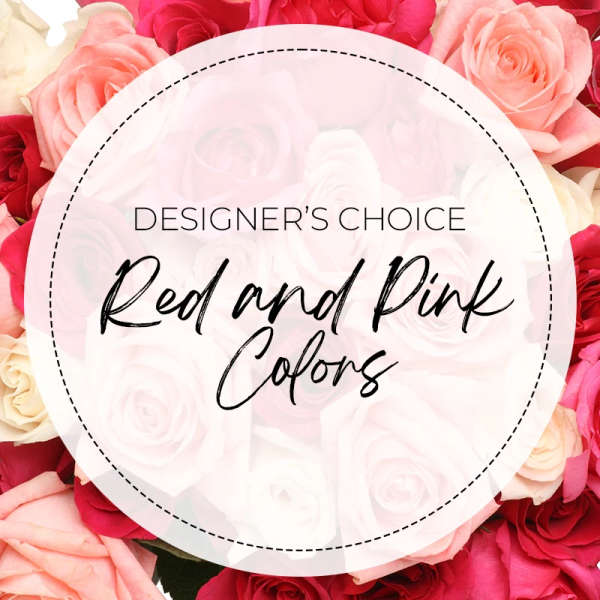 Red and pink roses arranged around a circular label