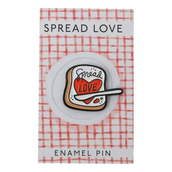 Enamel pin on a card with a toast and heart design