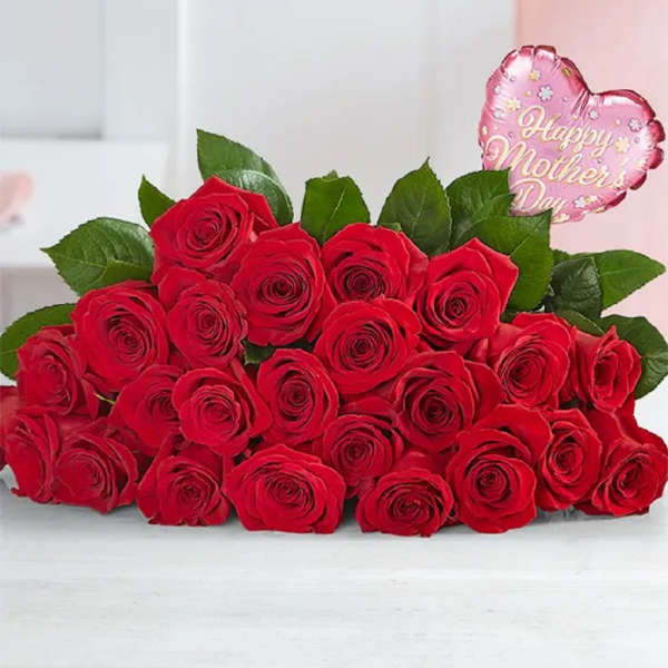 A bouquet of red roses with a pink Happy Mother's Day balloon.