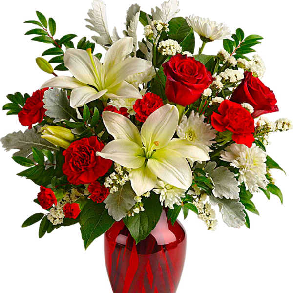 Red roses and white lilies in a red glass vase