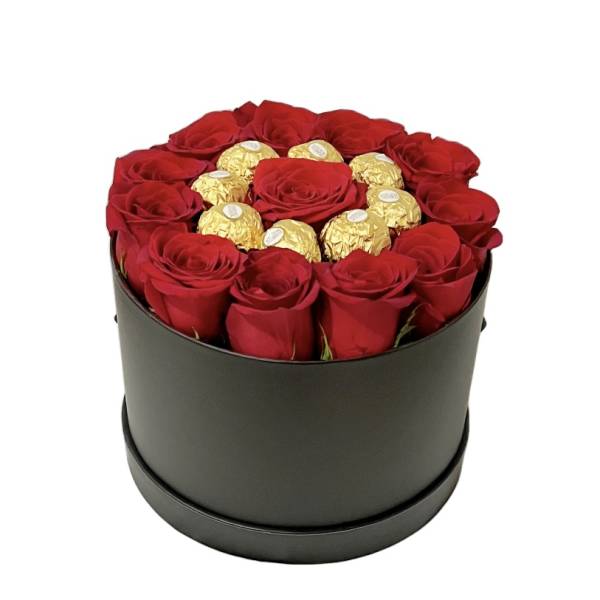 Red roses and gold-wrapped chocolates in a round black box