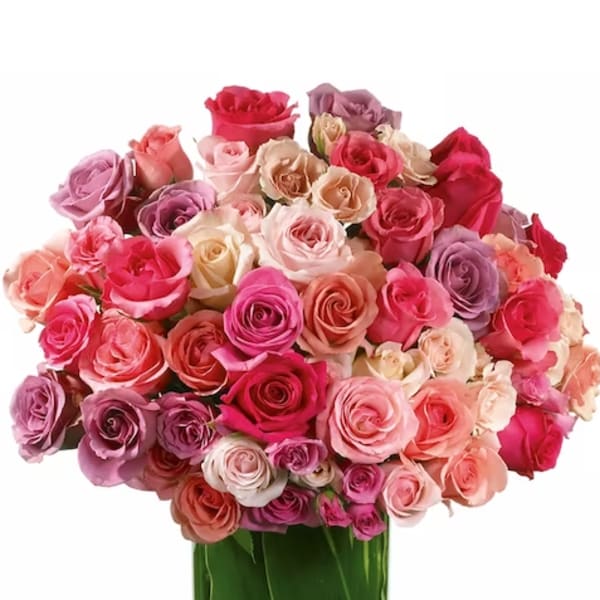 Bouquet of pink, peach, and lavender roses in a glass vase