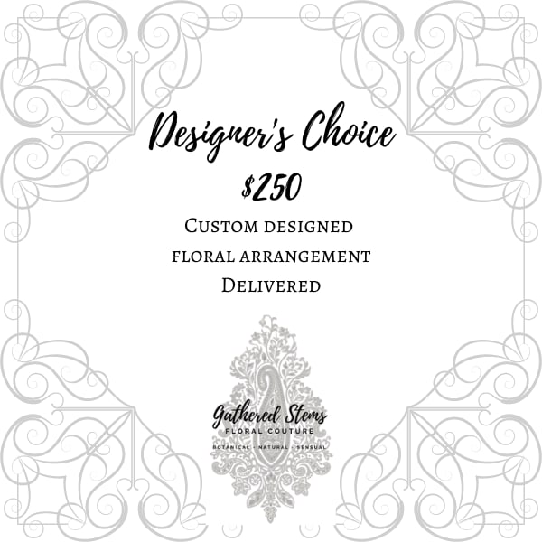 Decorative card reading Designer's Choice custom floral arrangement delivered