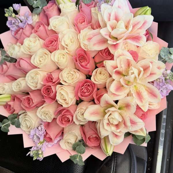 Pink and cream rose bouquet with white-pink lilies and lavender accents