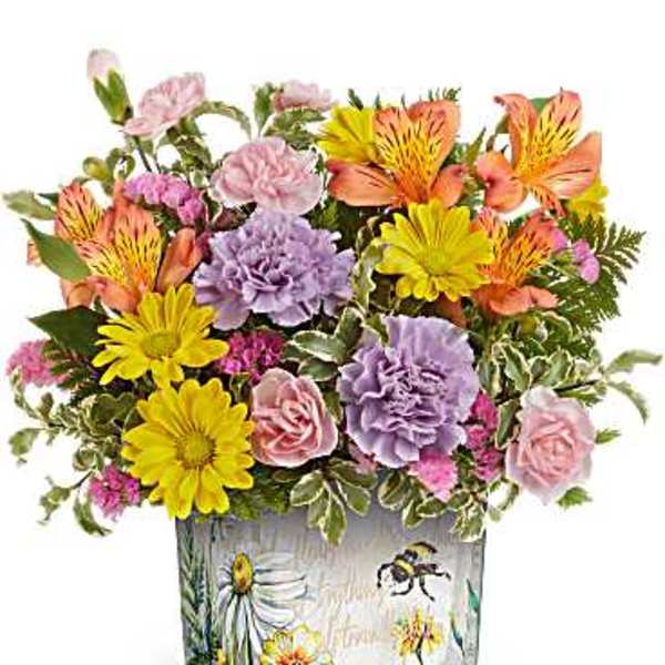 Colorful mixed bouquet in a painted glass vase
