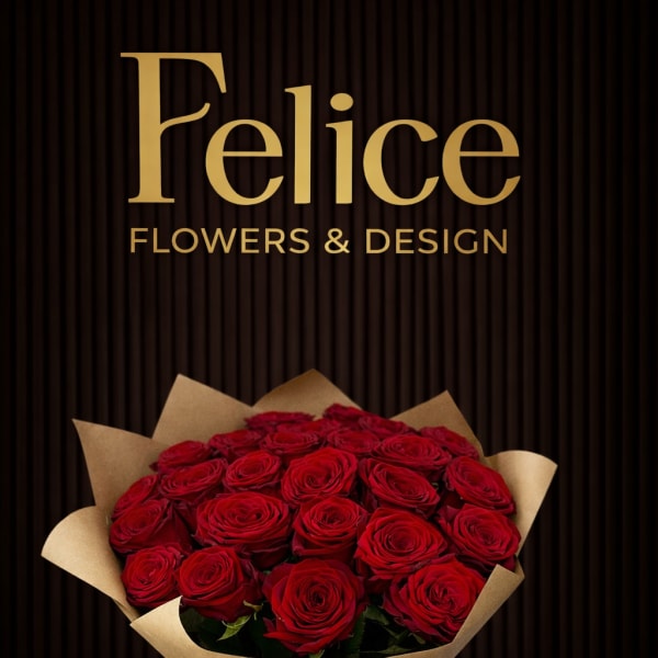 Bouquet of red roses wrapped in brown paper with a red ribbon