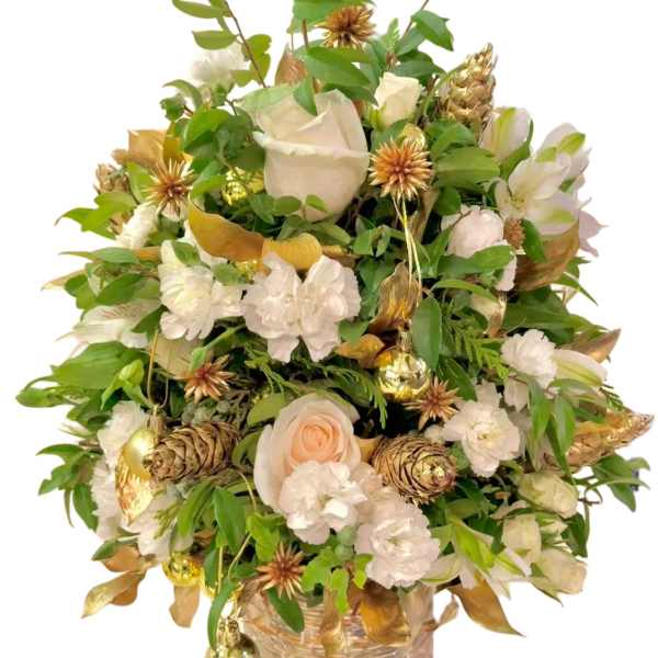 White and blush floral arrangement in a gold-toned vase