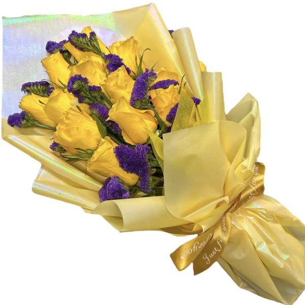 Yellow roses with purple filler wrapped in gold paper