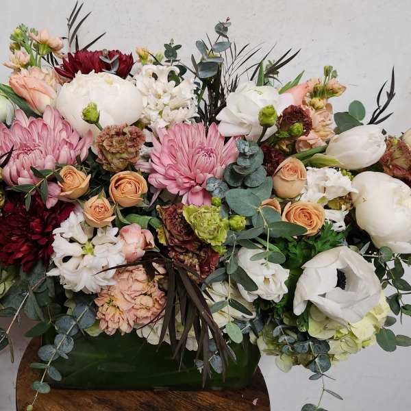 Large mixed bouquet with pink, white, and burgundy flowers