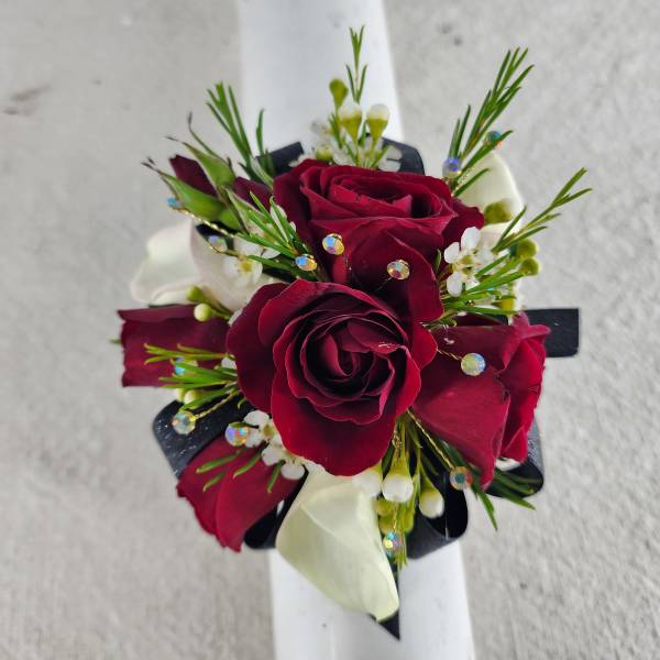 Red Hot Prom Corsage offering three options of flowers - Red roses, Orchids and Calla Lilies