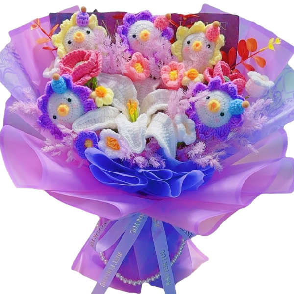 Bouquet of crocheted chick figures wrapped in purple paper
