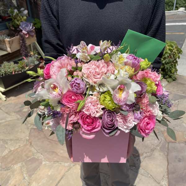 Large pink and white mixed bouquet in a pink box