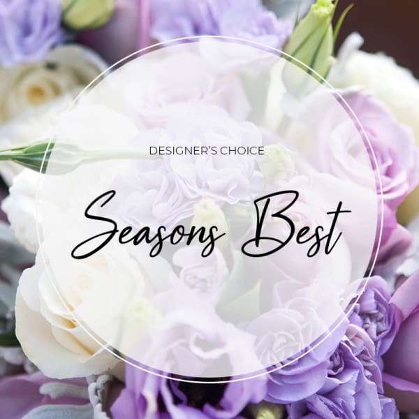 Pastel bouquet of white and lavender roses with a few green buds