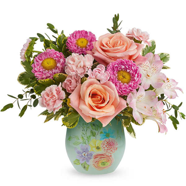 Pink roses and daisies arranged in a painted vase