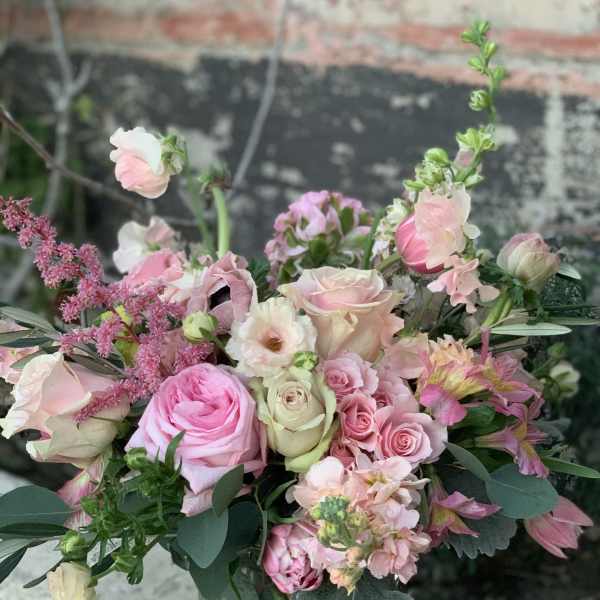 Pink and white mixed bouquet in a glass vase