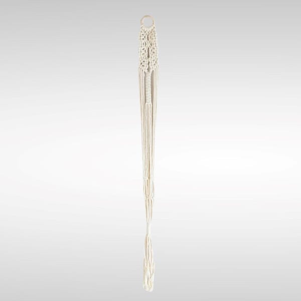 Cream macramé wall hanging with a ring top and long tassels