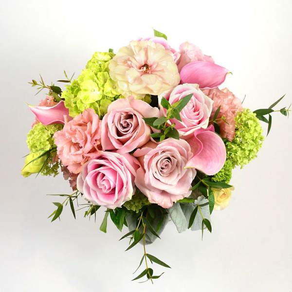 Pink and cream bouquet with roses, calla lilies, and green hydrangeas