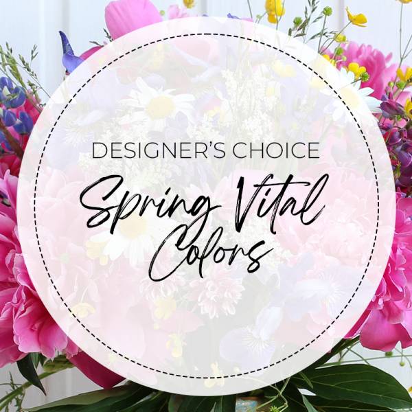 Mixed bouquet with pink and white flowers and a spring-themed label