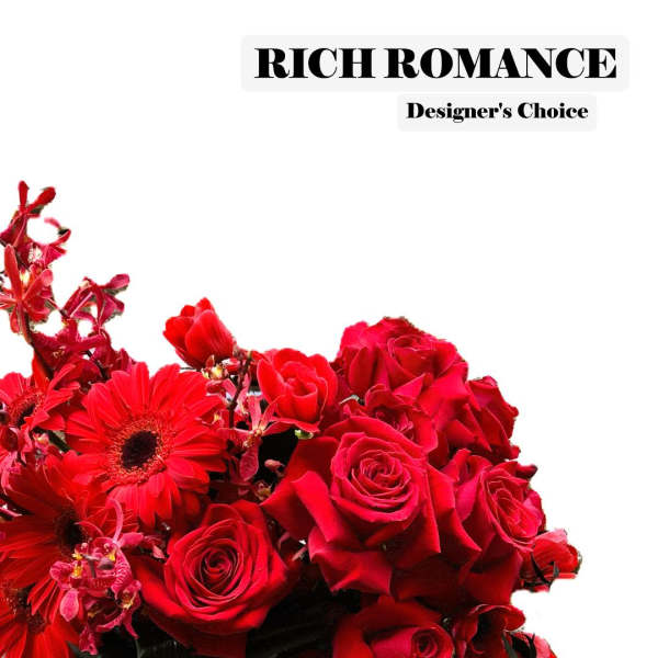 Red roses and gerbera daisies arranged beneath "Rich Romance" text