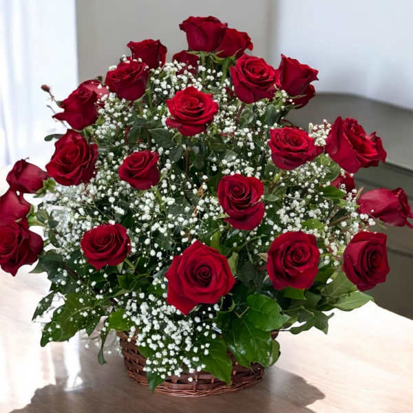 Basket of red roses with white baby's breath