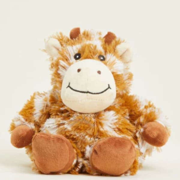 Plush giraffe toy with brown and white fur sitting on a plain background