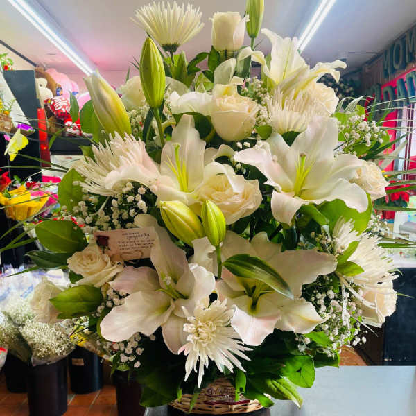 Lilies Sympathy Basket Arrangement