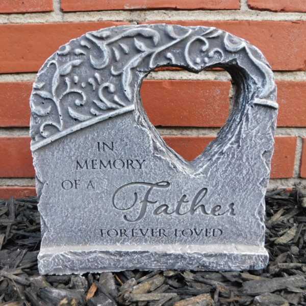 Stone memorial plaque reading "In Memory of a Father Forever Loved"